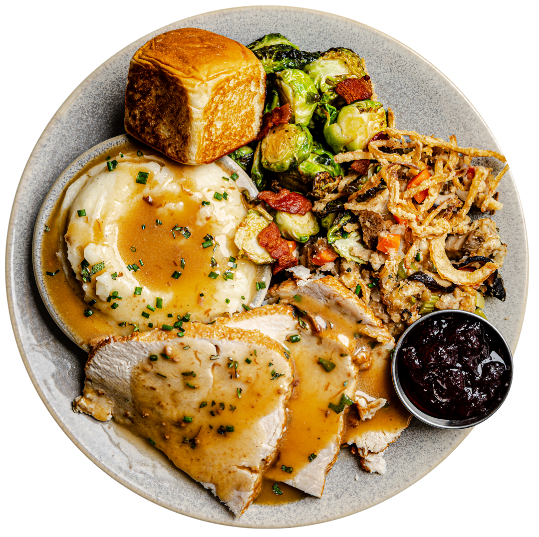 a plate of food with a black background