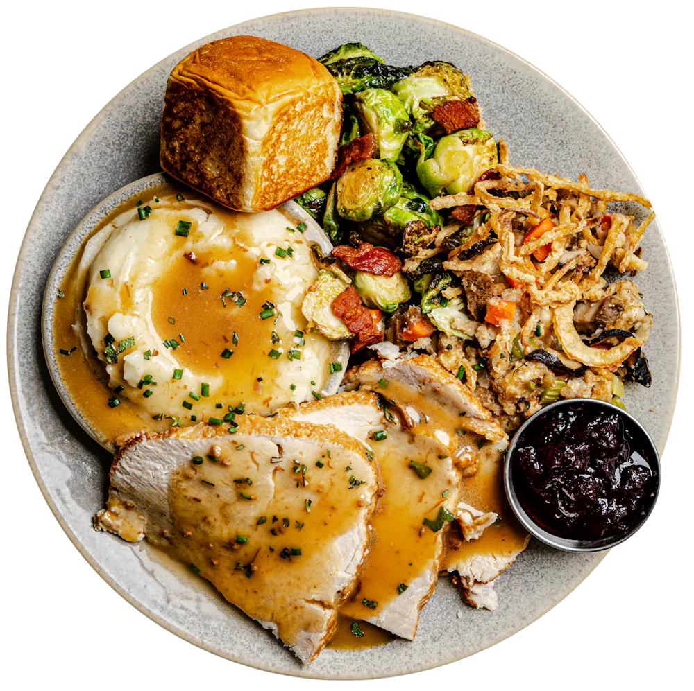 a plate of food with a black background