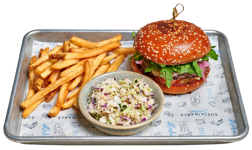Wagyu cheeseburger with lettuce, tomato, pickled onions and melted cheese on a sesame brioche bun, served with fries and house-made coleslaw.