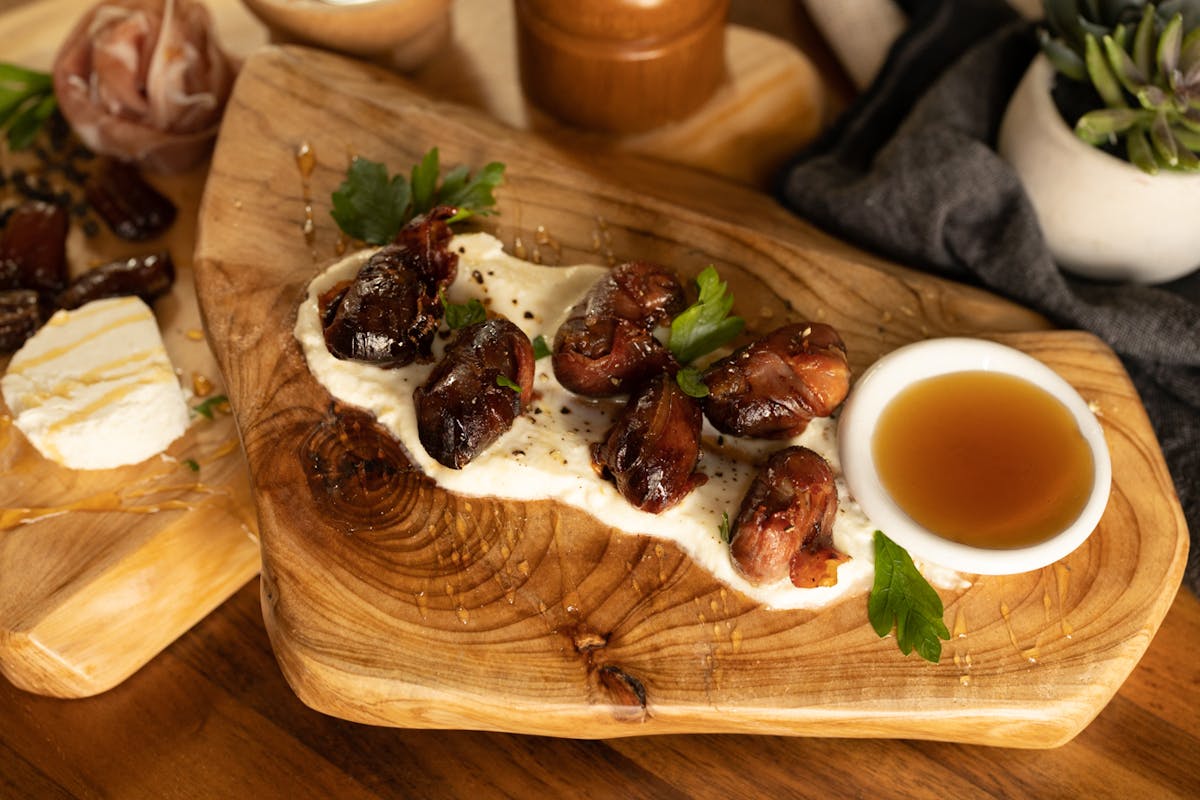 a plate of food on a wooden table