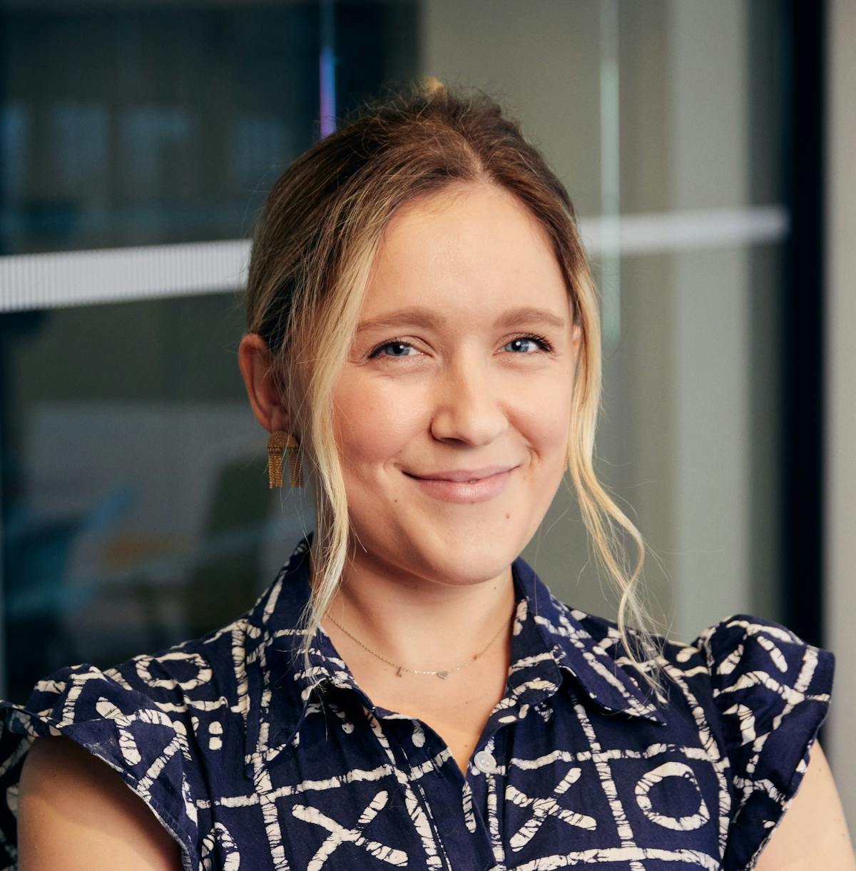 a woman smiling for the camera