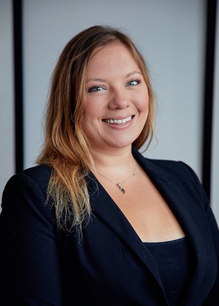 a woman smiling for the camera