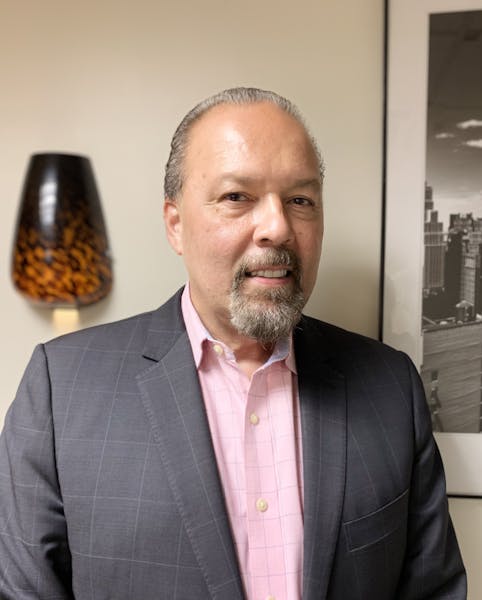 a man wearing a suit and tie
