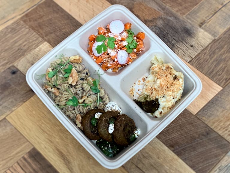 The Jackson Heights Farmer's Market Bento on a table