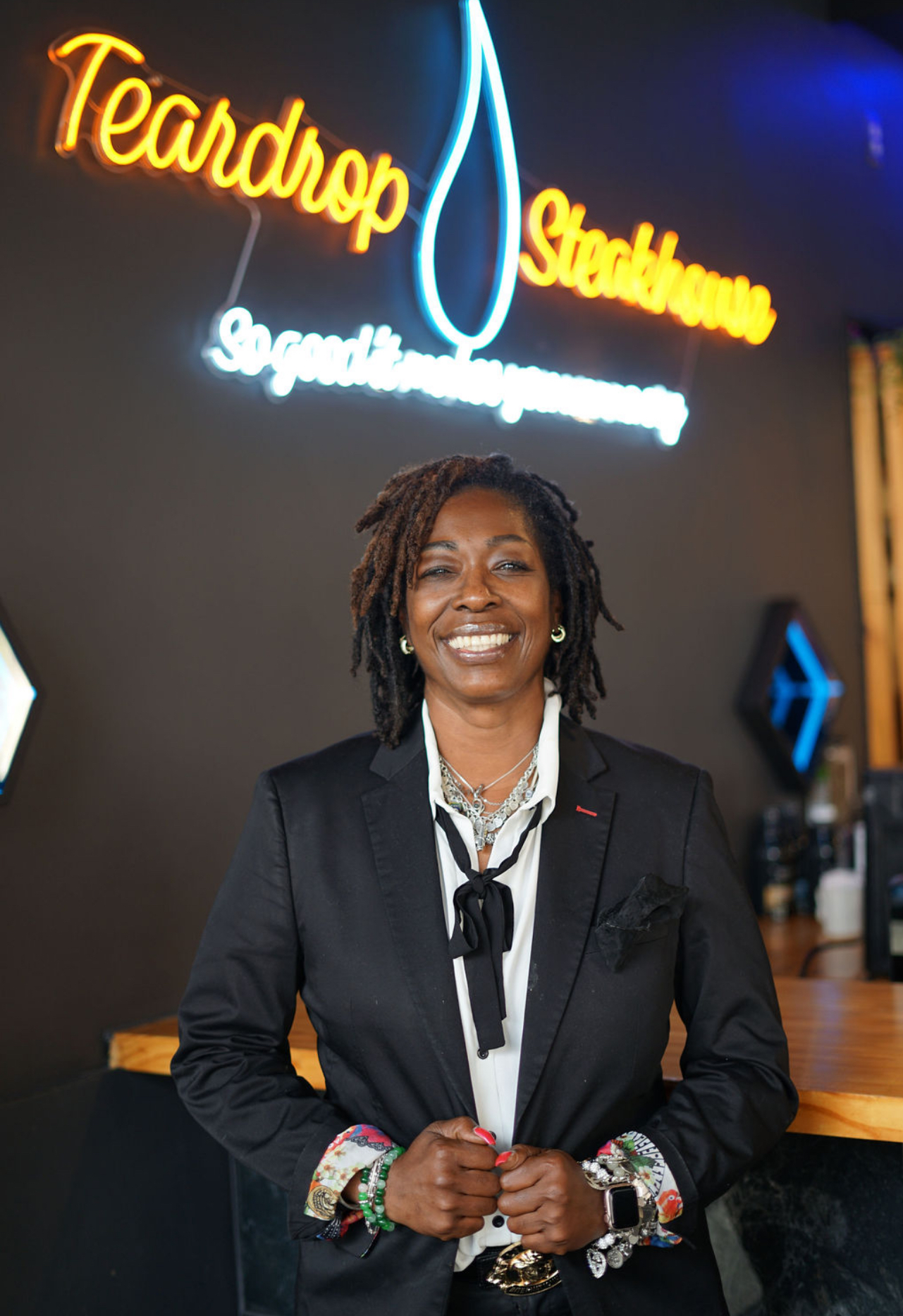 a woman smilling for the camera