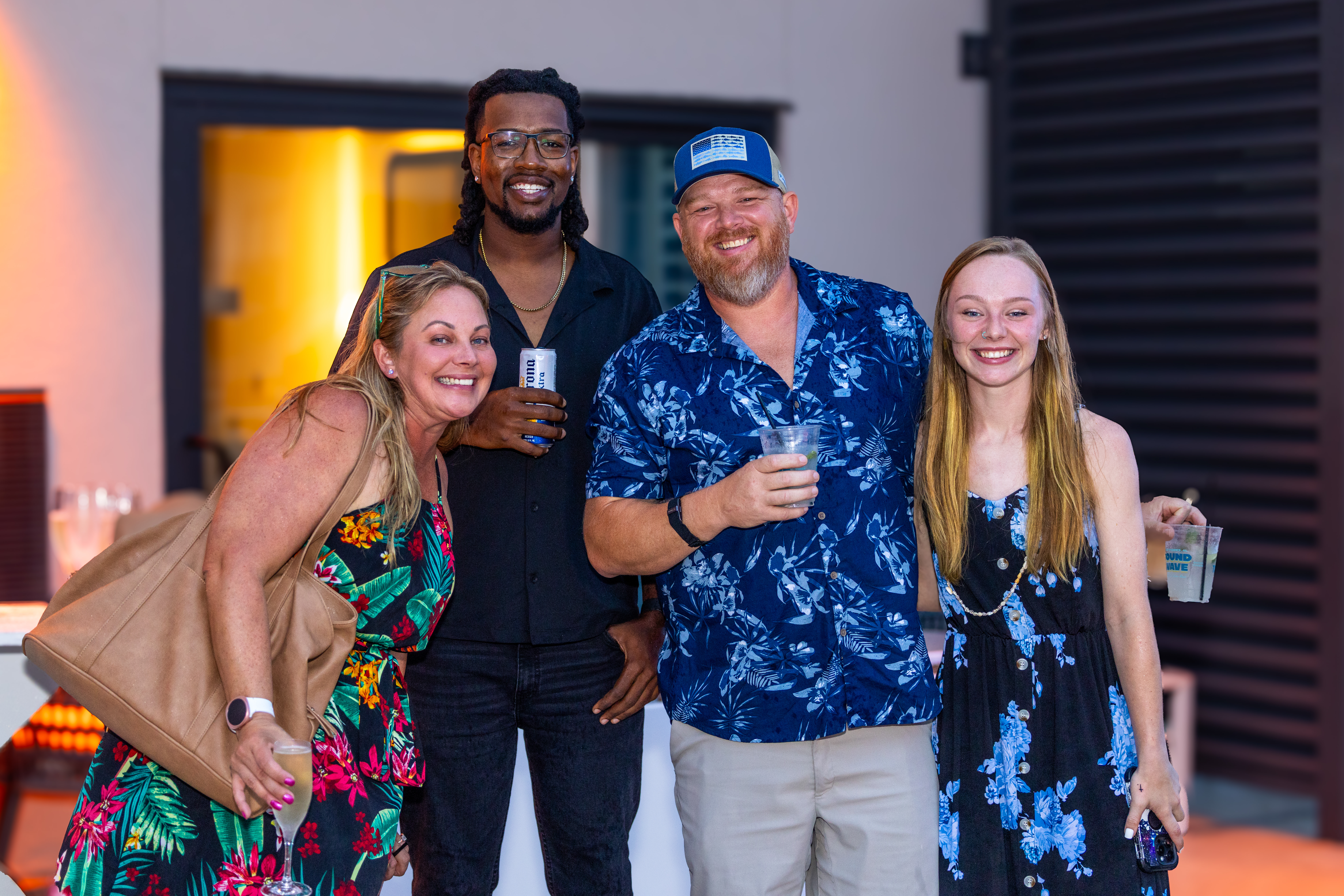 Friends celebrating at Soundwave rooftop bar Gulf Shores