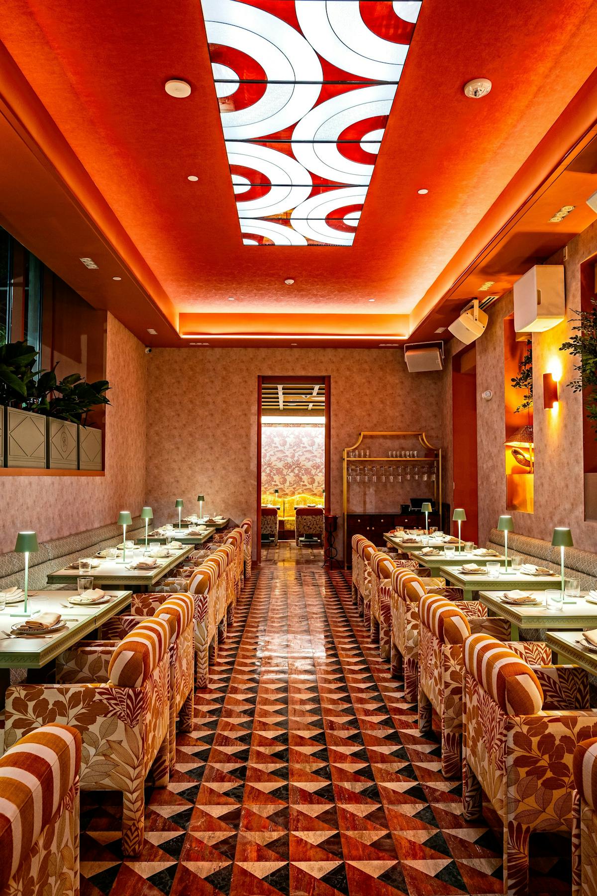 a dining room table in front of a building