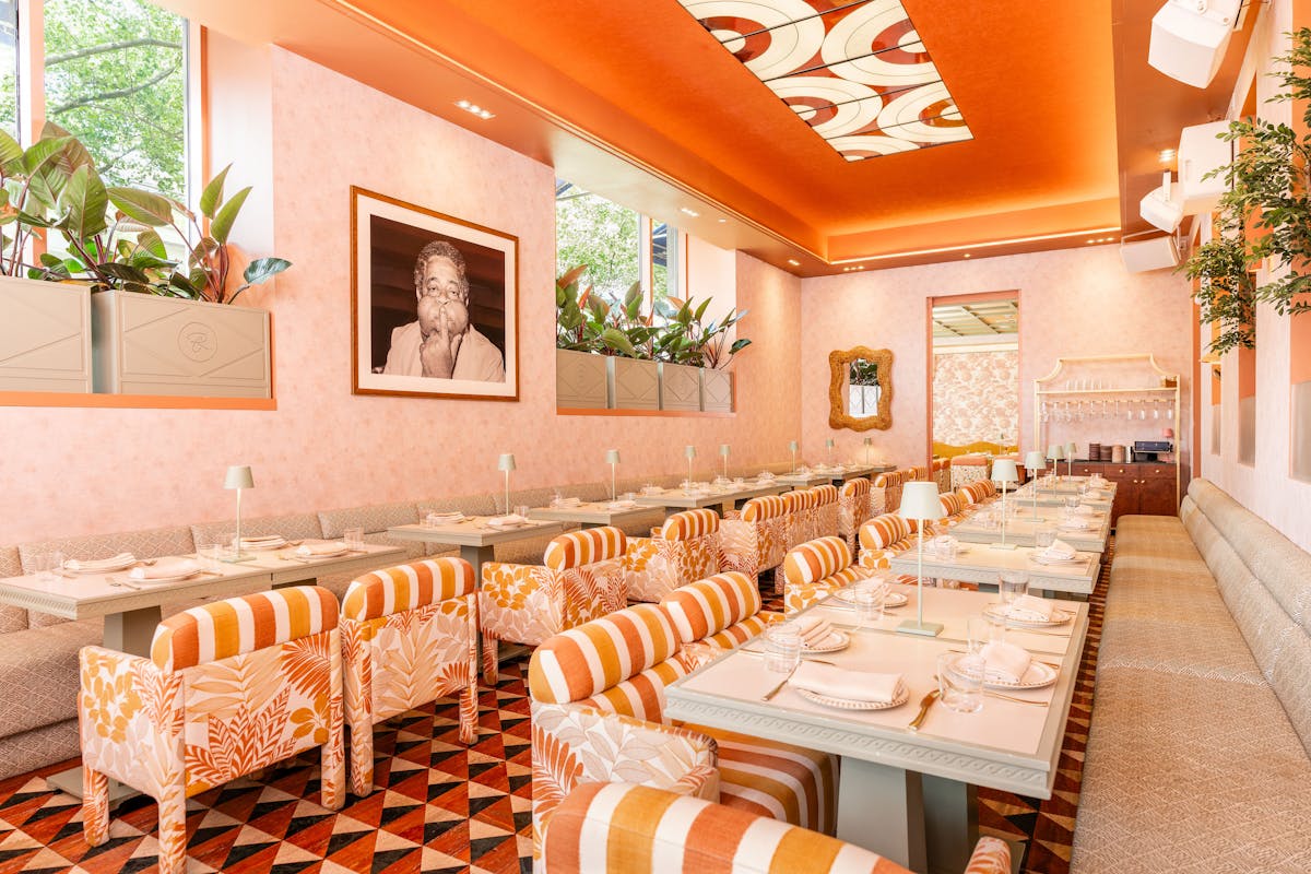 a room filled with furniture and a table