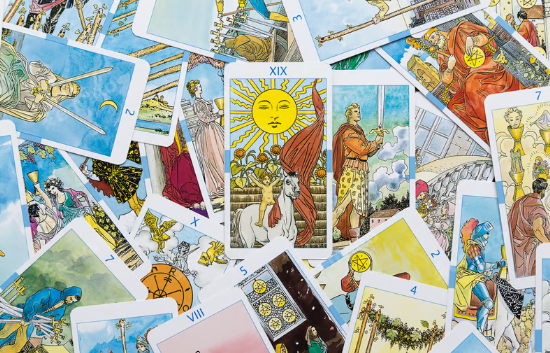 a pile of tarot cards