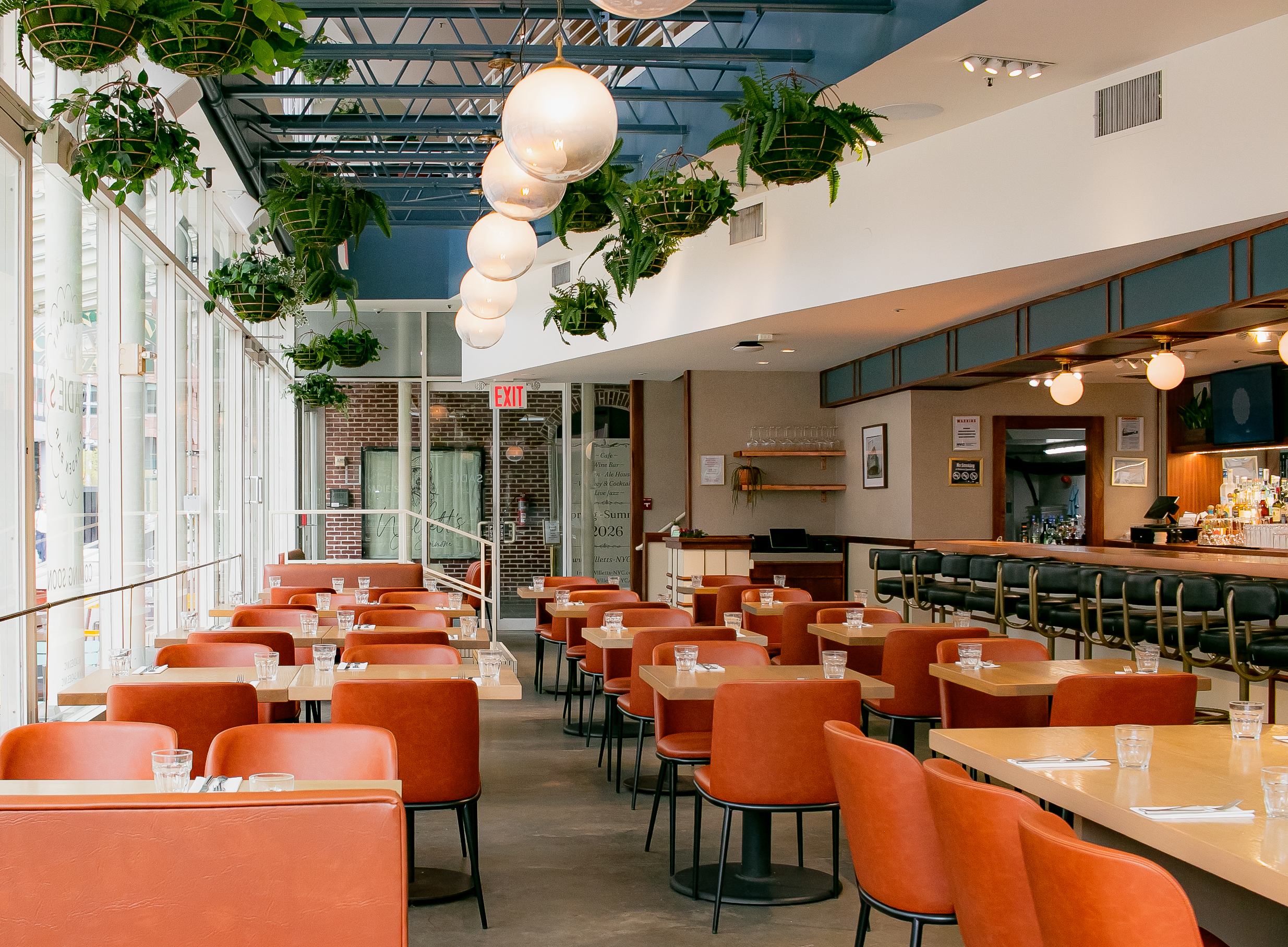 a restaurant with tables and chairs