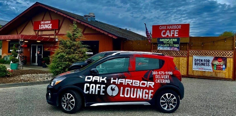 a car parked in front of a house