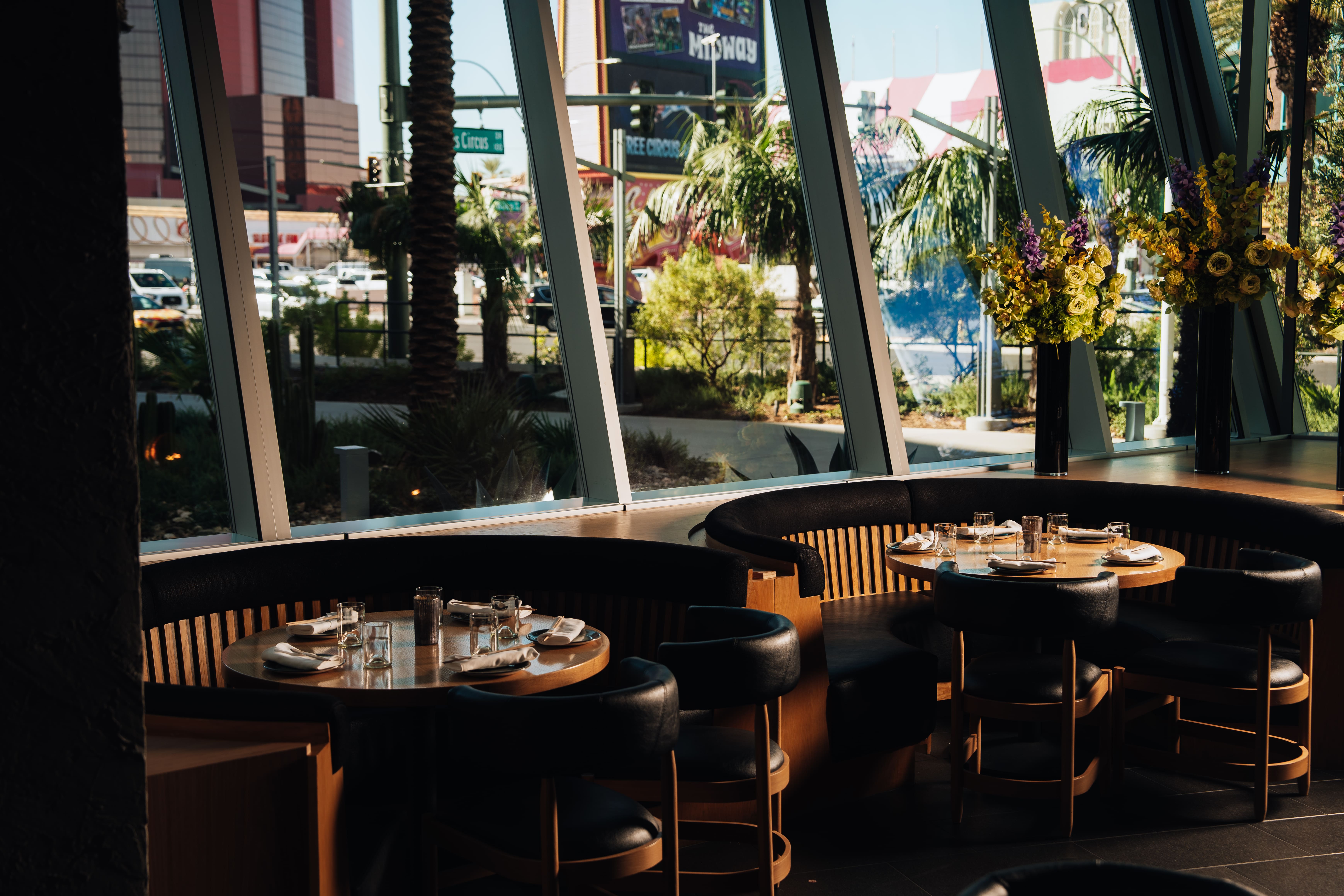 a dining room table in front of a store