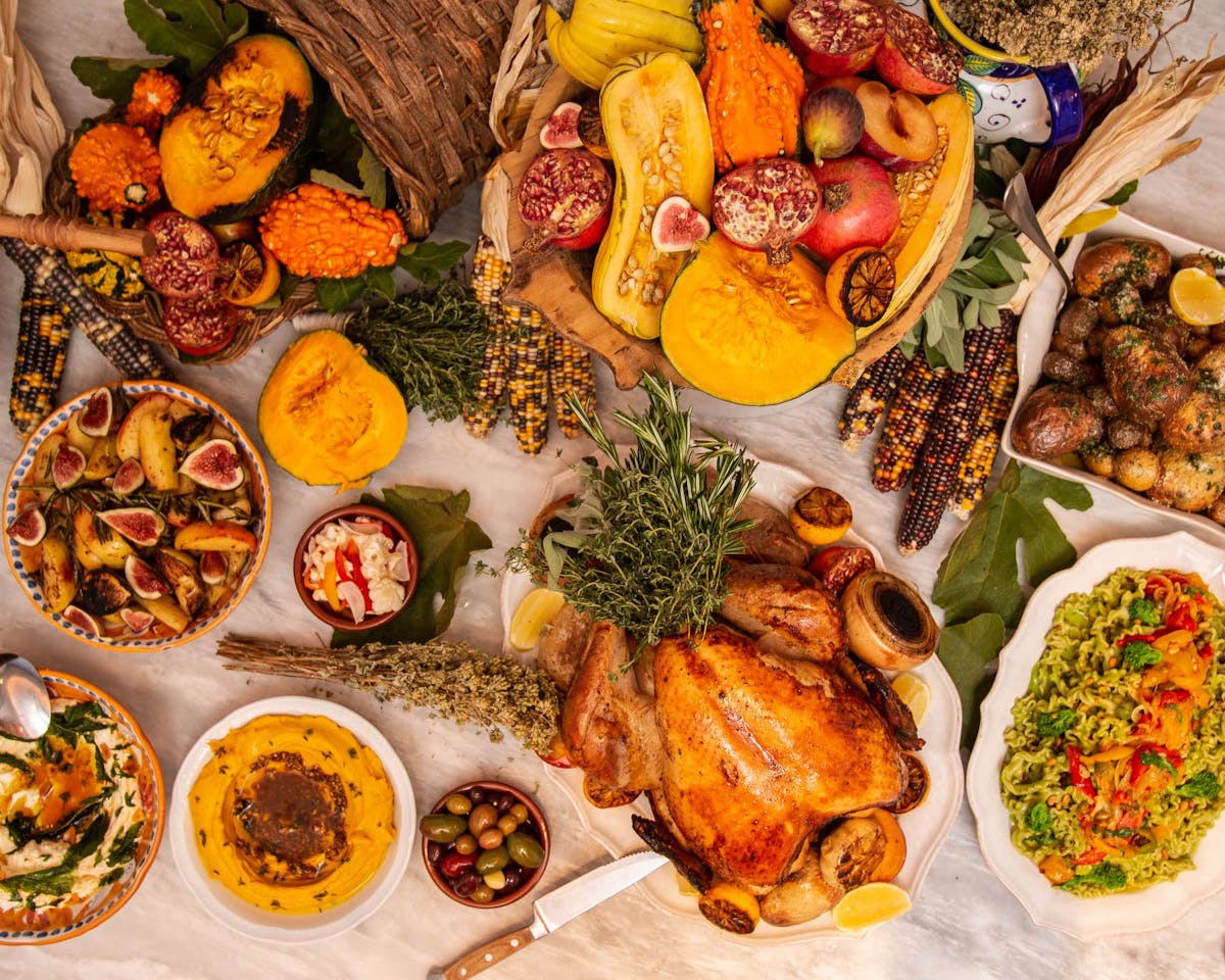 a bunch of different types of food on a table