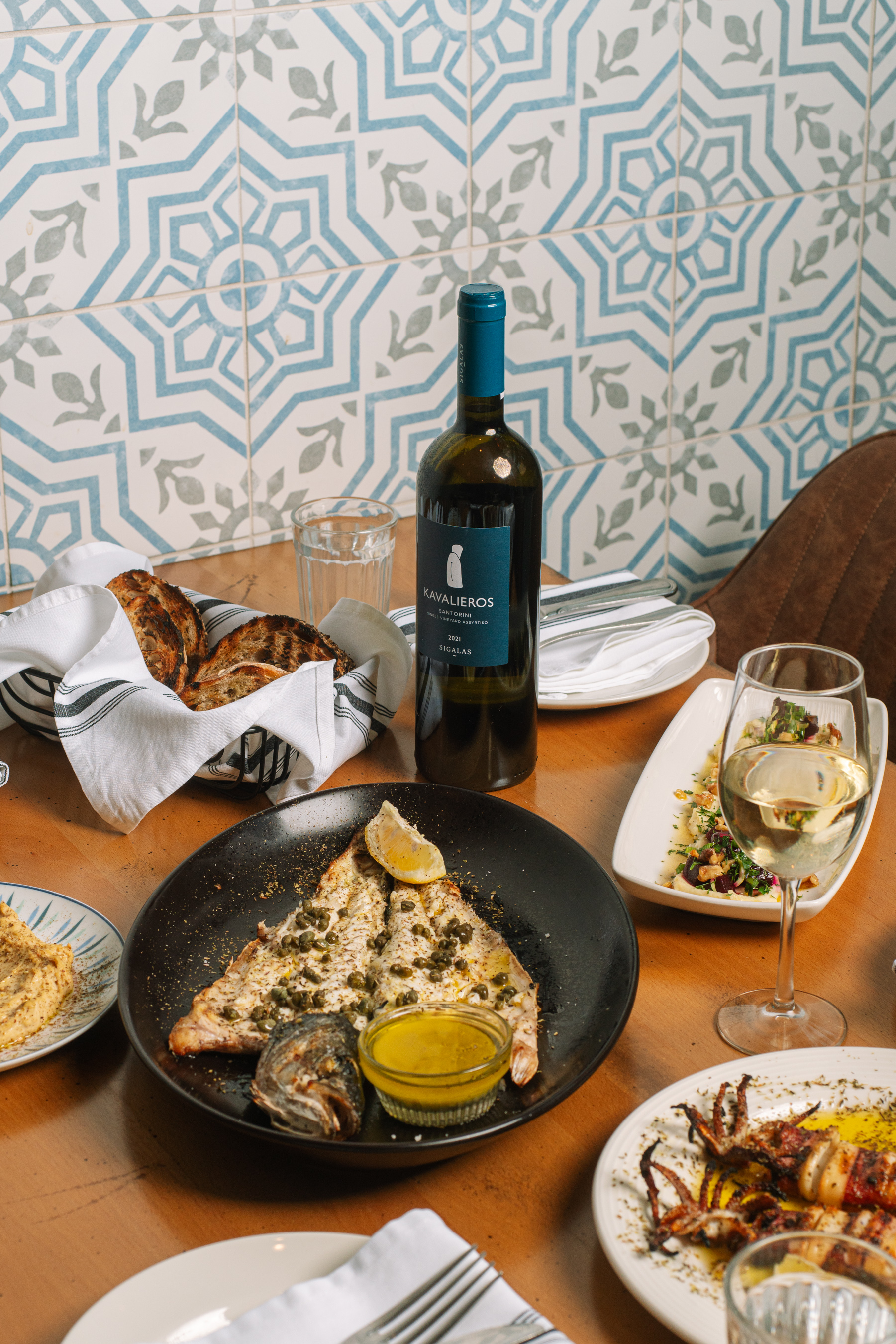 a table topped with plates of food on a plate