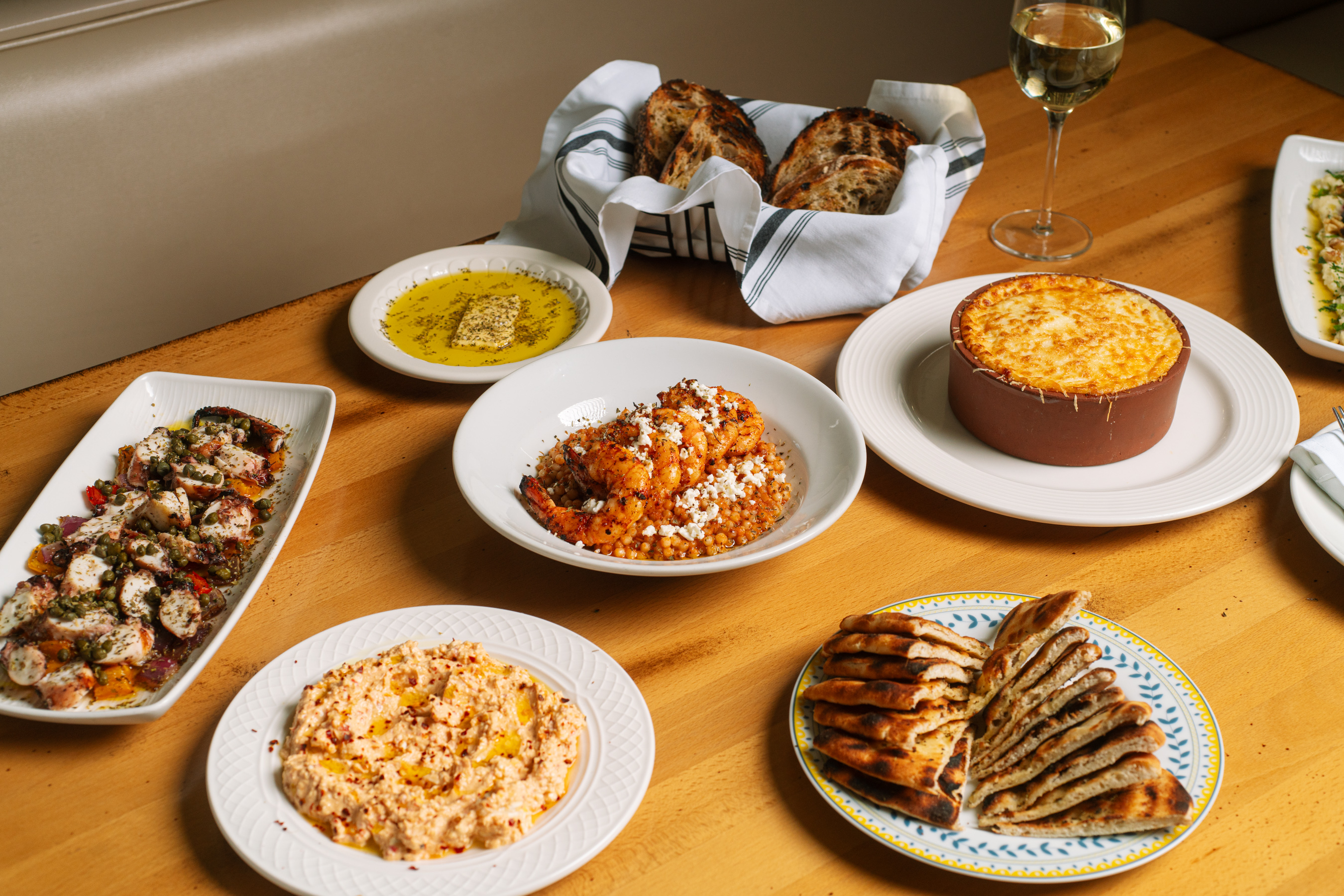 a table topped with plates of food on a plate
