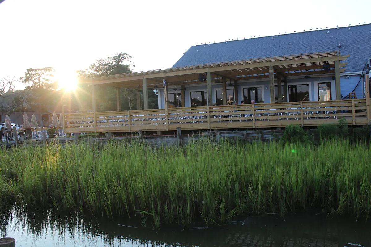 a building next to a body of water