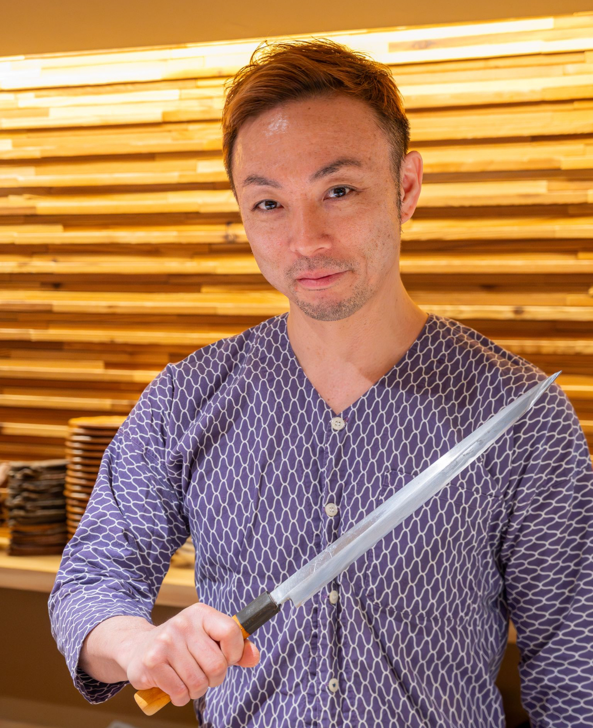 a man holding a knife