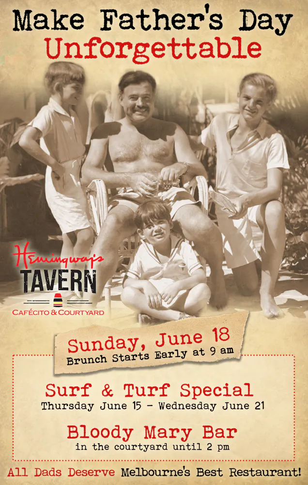 Ernest Hemingway et al. posing for a photo