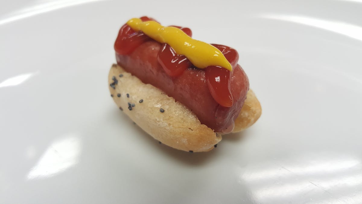 a hot dog on a bun