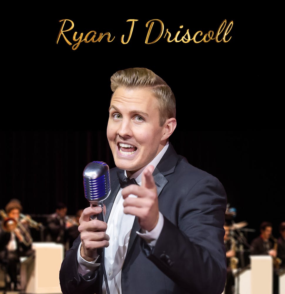 a man holding a glass of wine