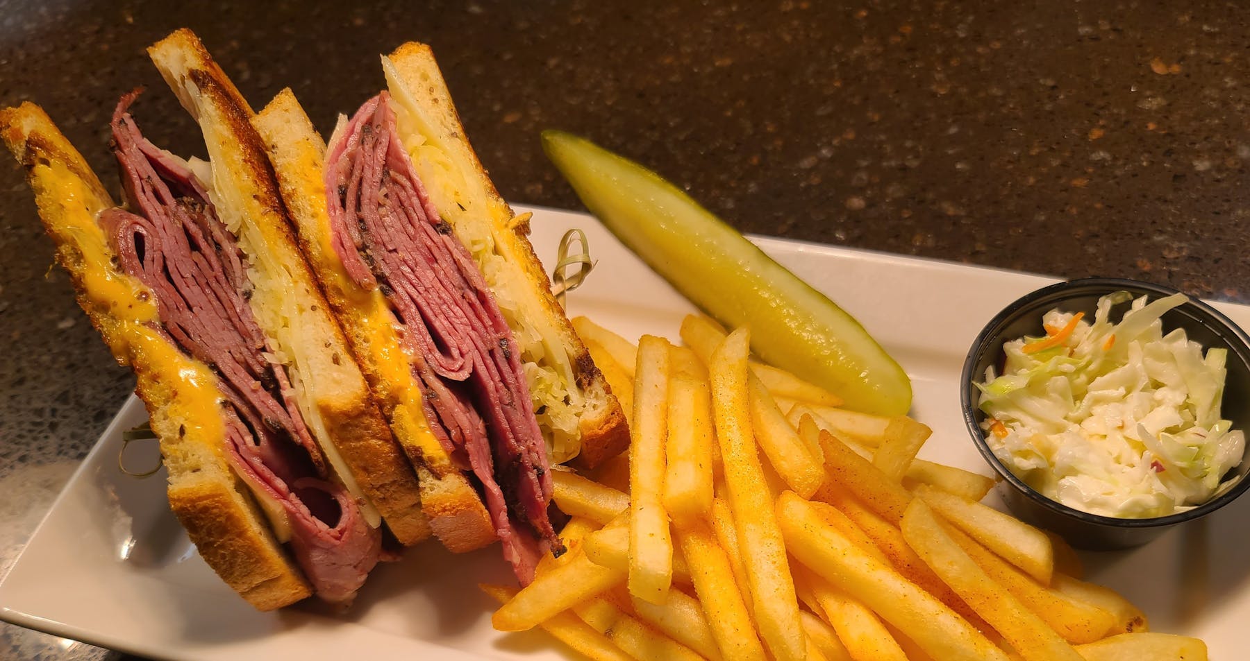 a sandwich and fries on a plate