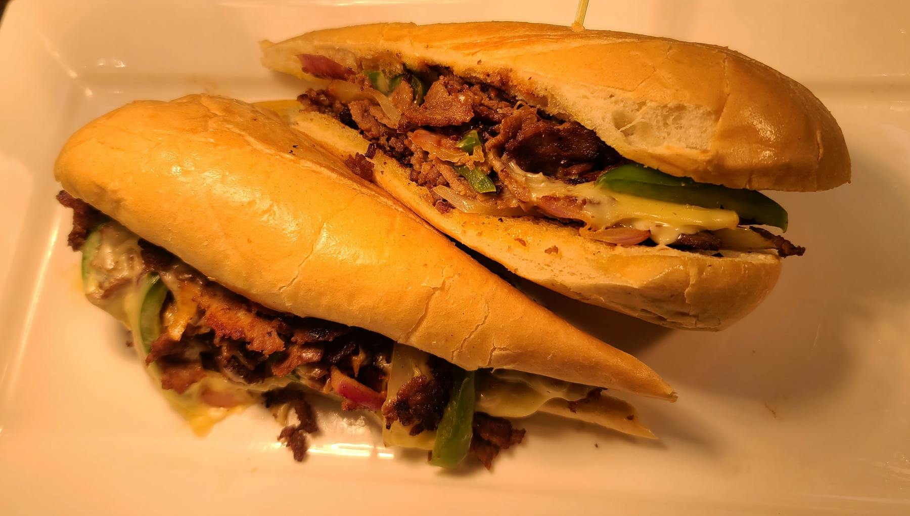 a sandwich cut in half on a plate