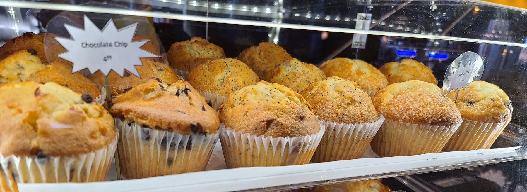 a display case filled with lots of food
