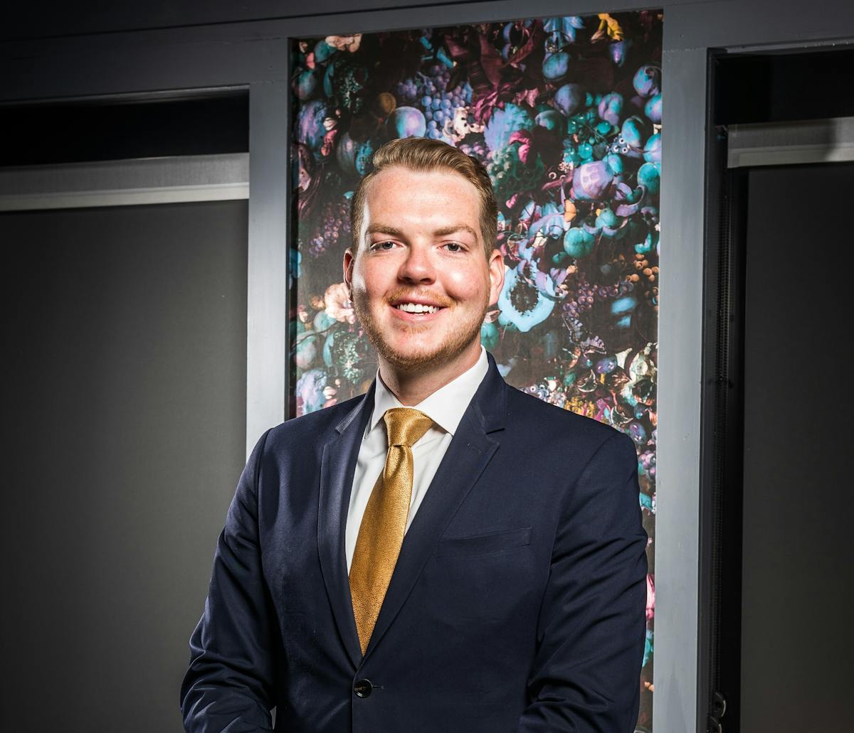 a man wearing a suit and tie