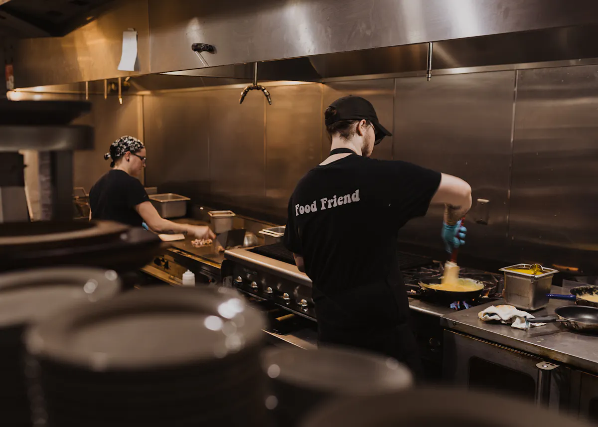 a man cooking in a kitchen