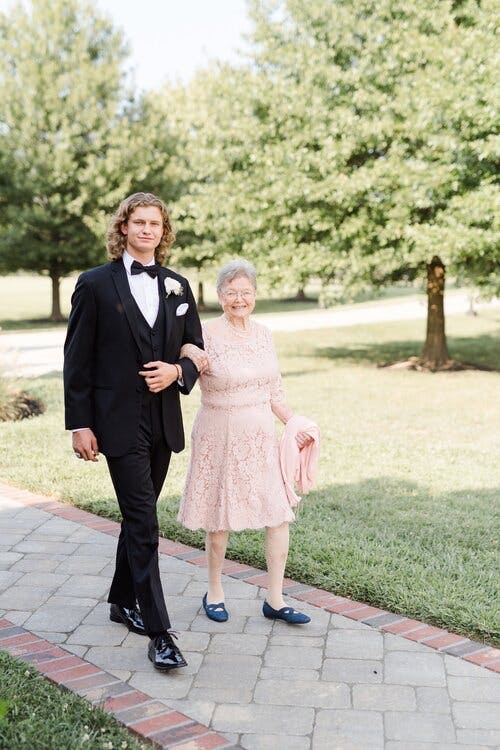 a person standing on a sidewalk