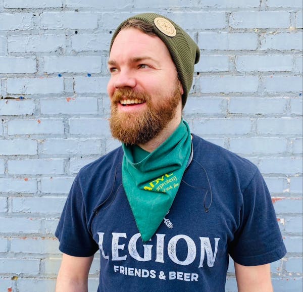 a man wearing a blue shirt