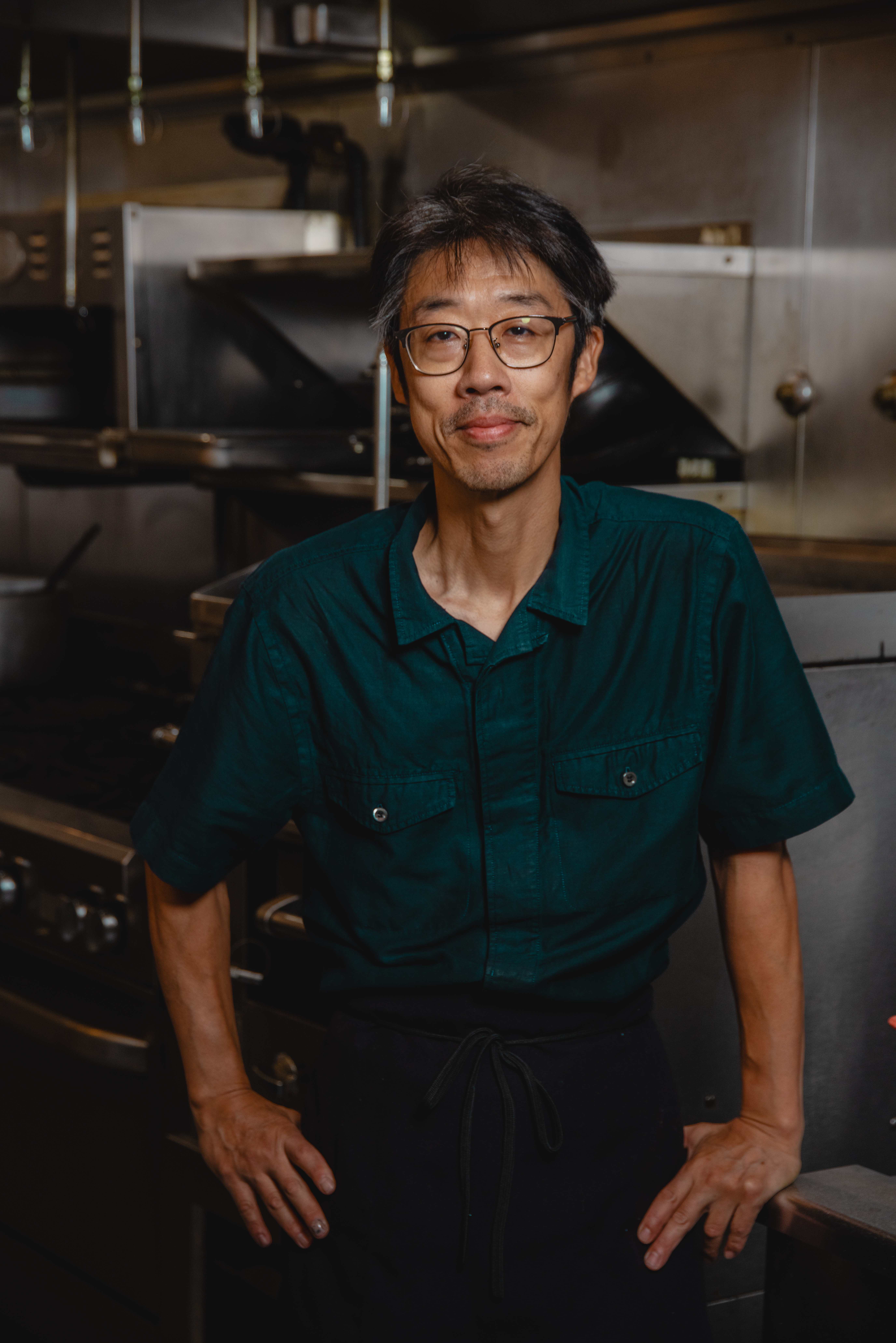 a man in a kitchen