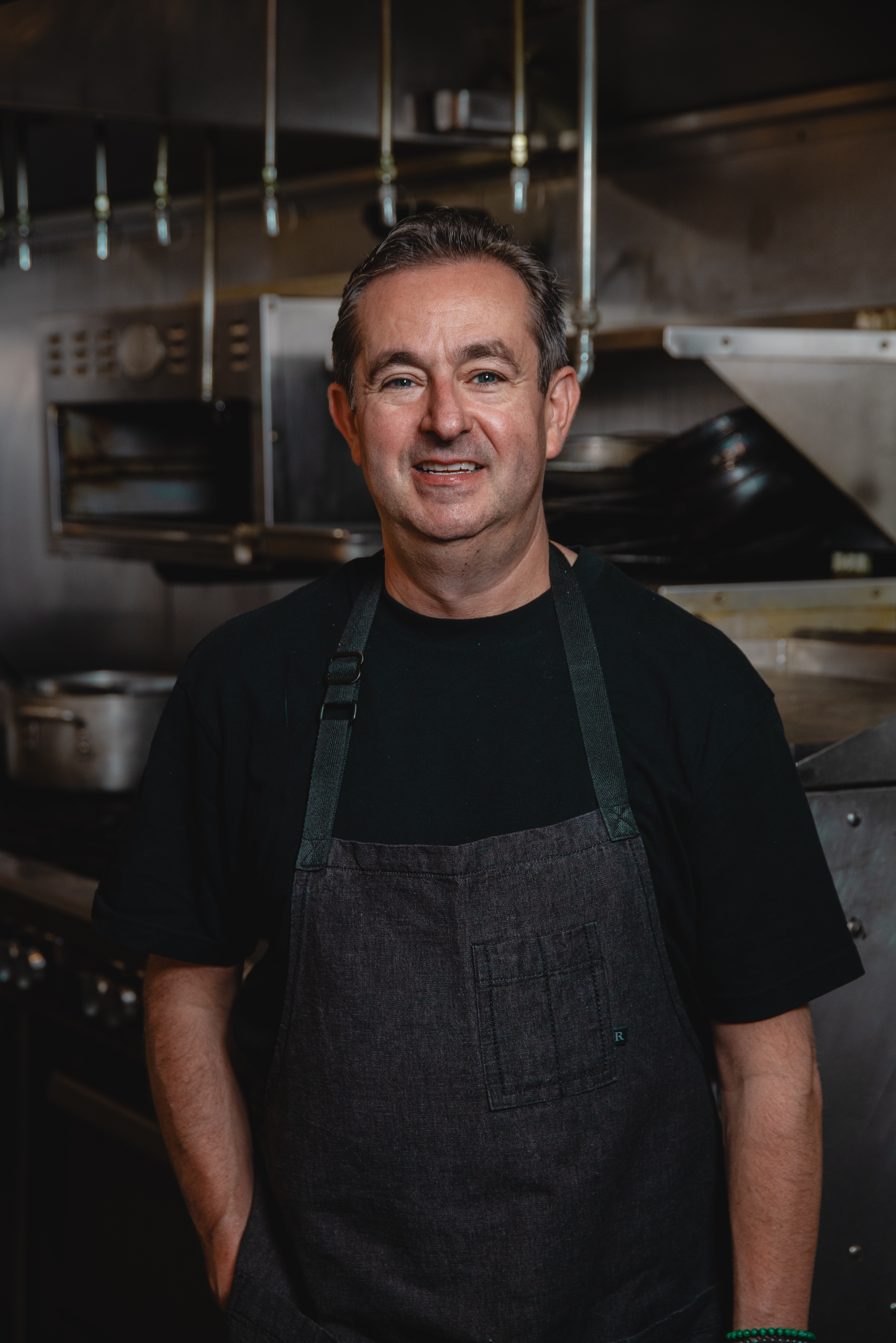 a man in a kitchen