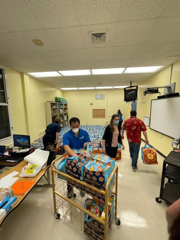 a group of people standing in a room