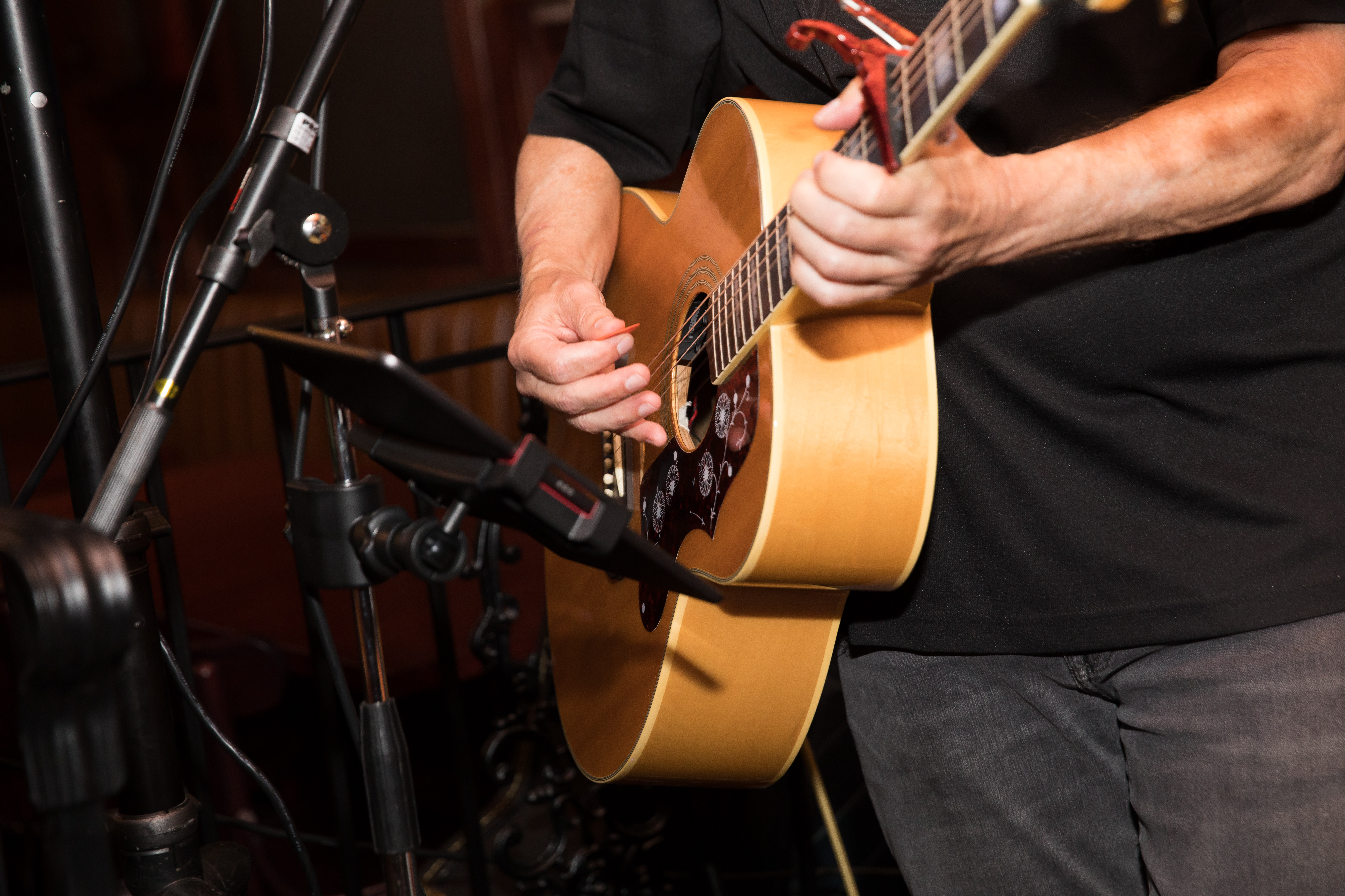 a person playing a guitar