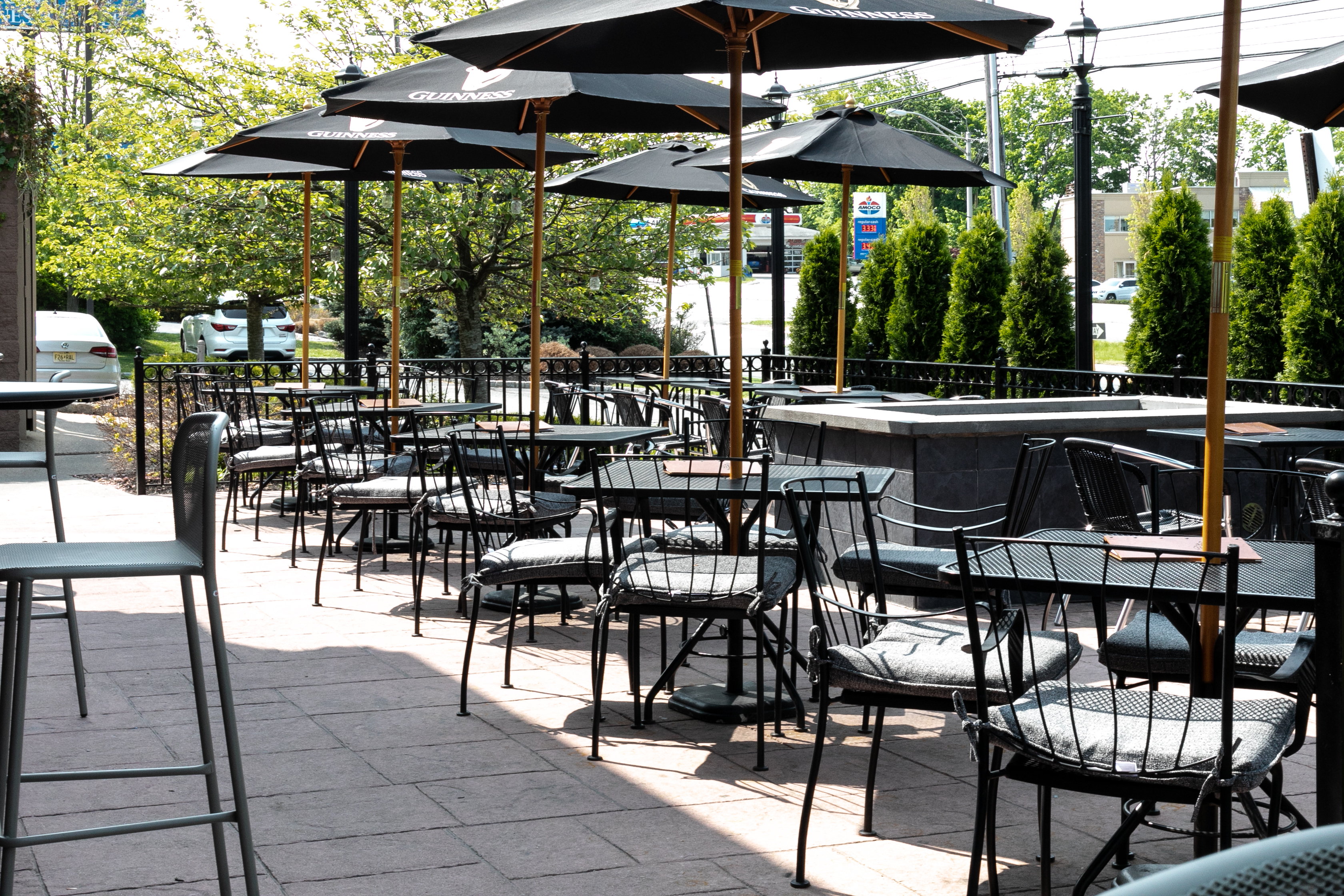 a group of lawn chairs sitting on top of a picnic table