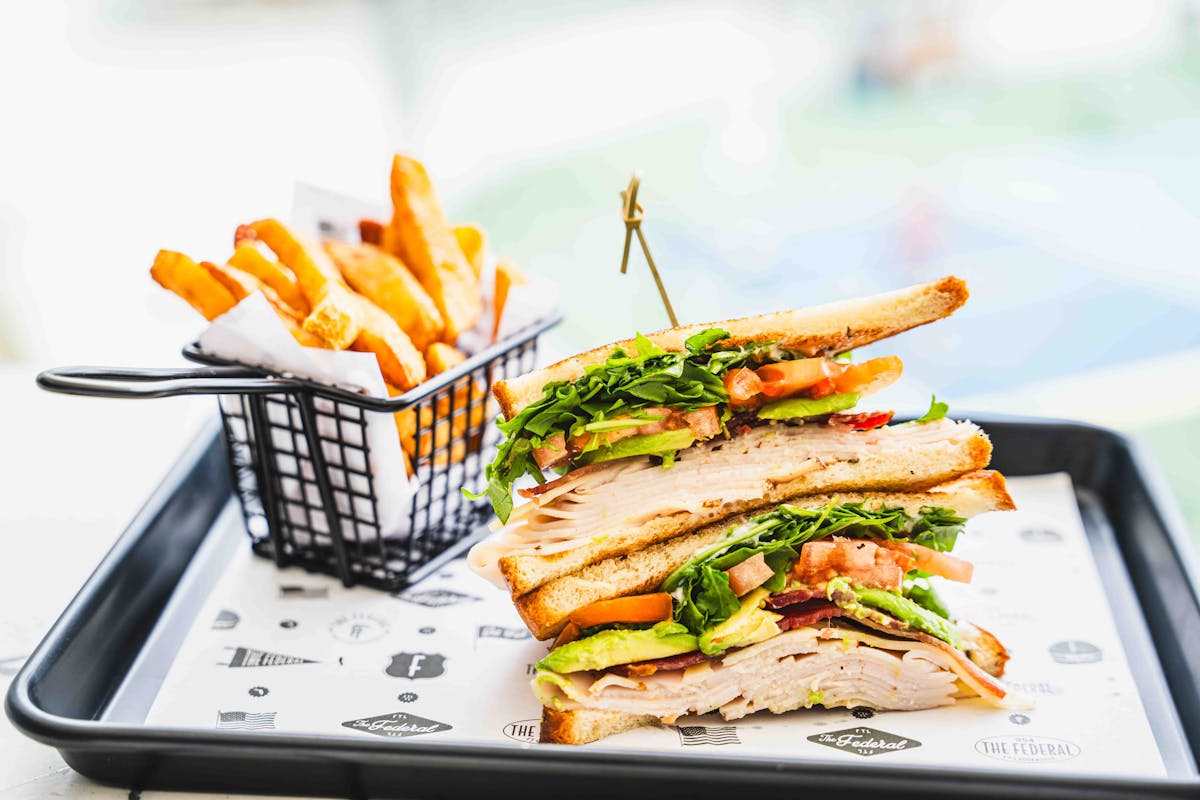 a sandwich cut in half on a plate