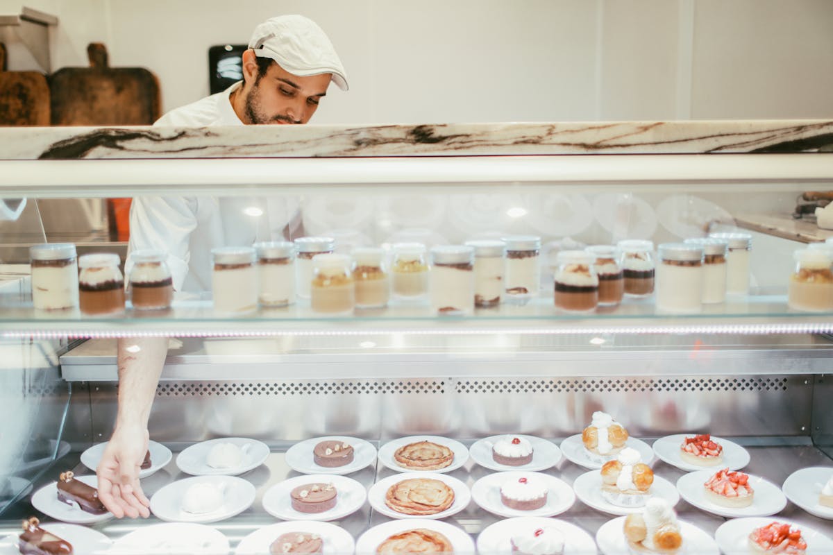 a refrigerator filled with cold desserts