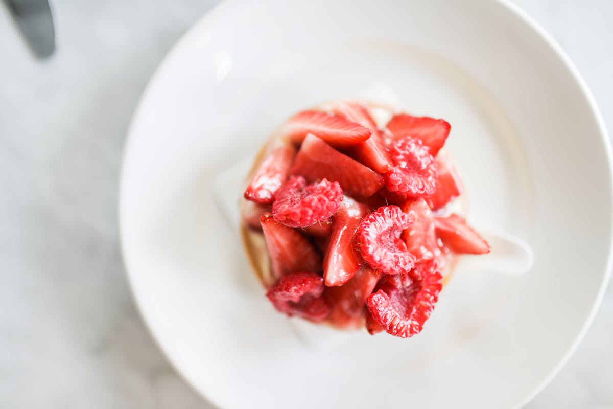 a close up of a strawberry dessert