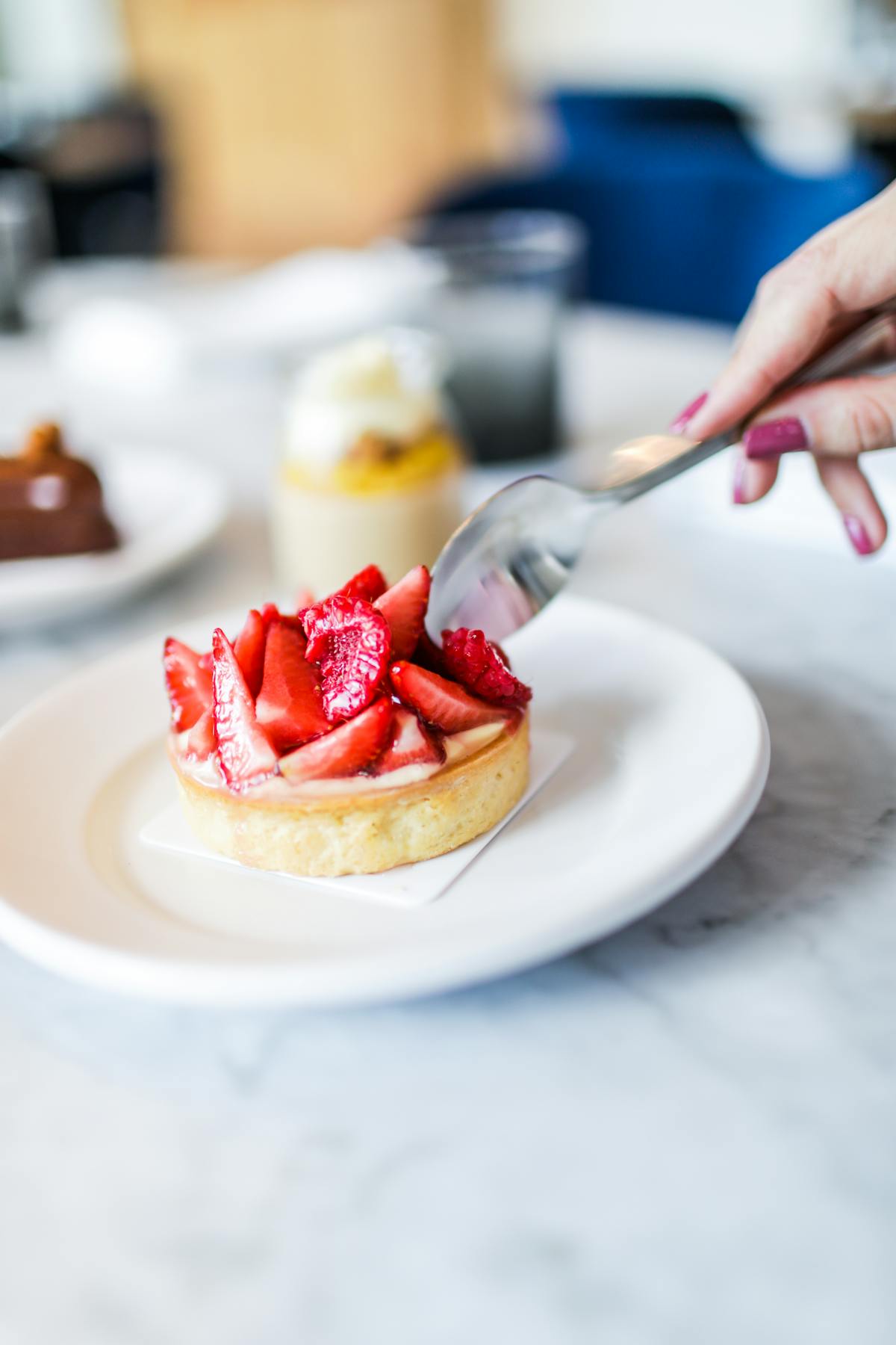 a close up of a strawberry cake