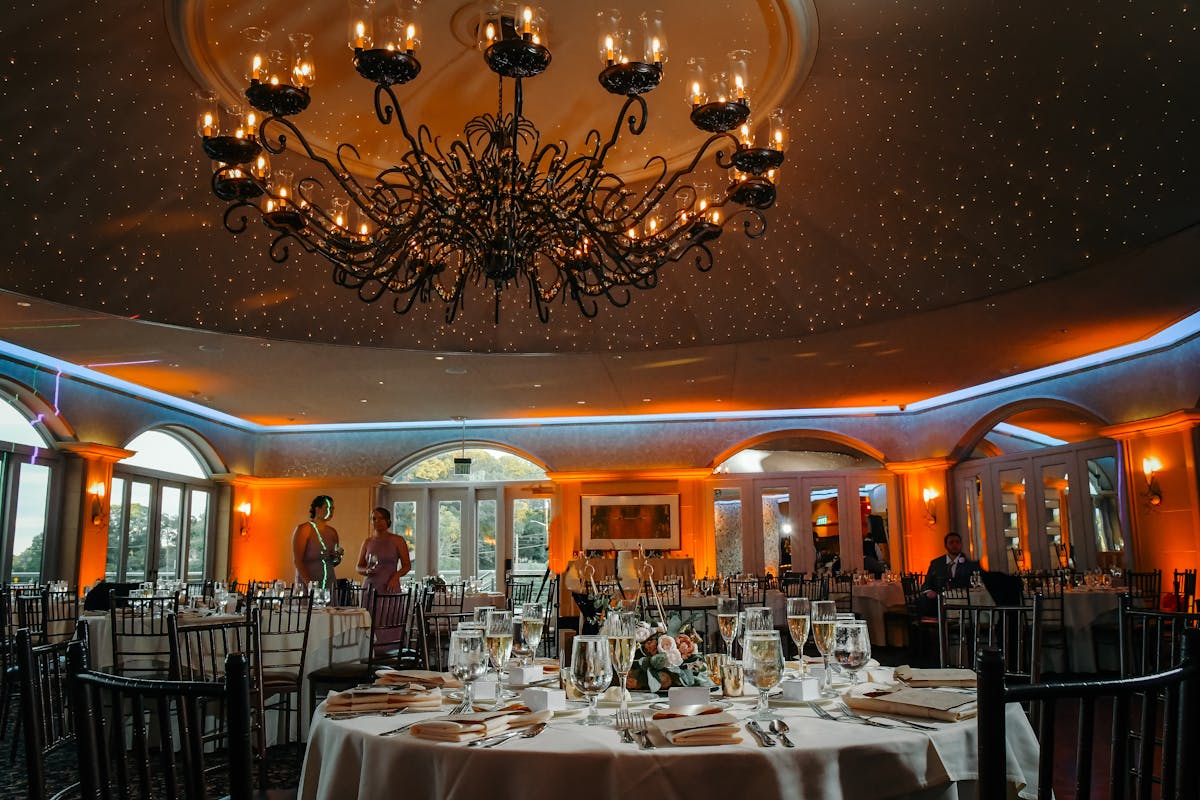 a dining table filled with wine glasses