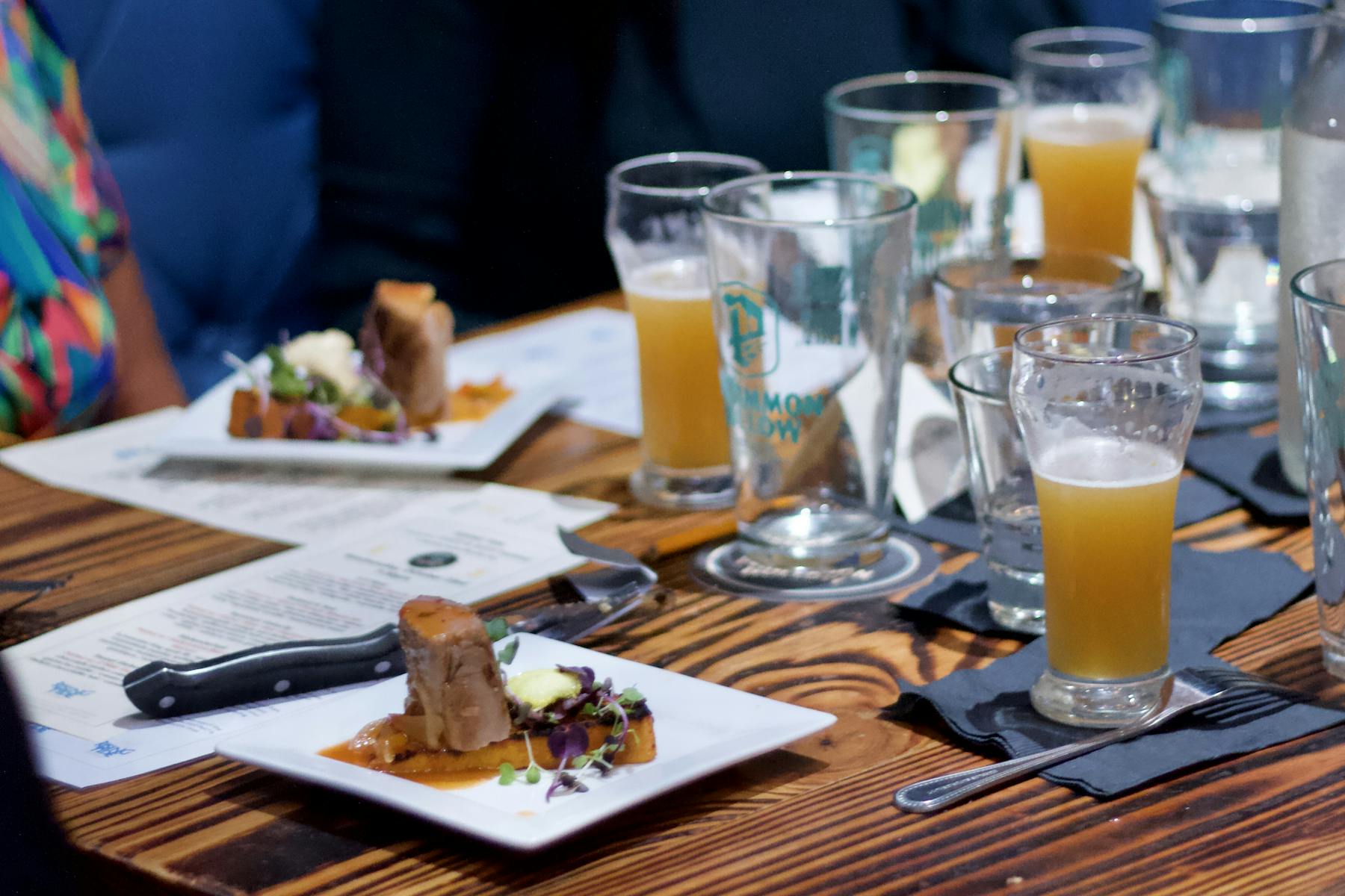 a group of beer glasses on a table