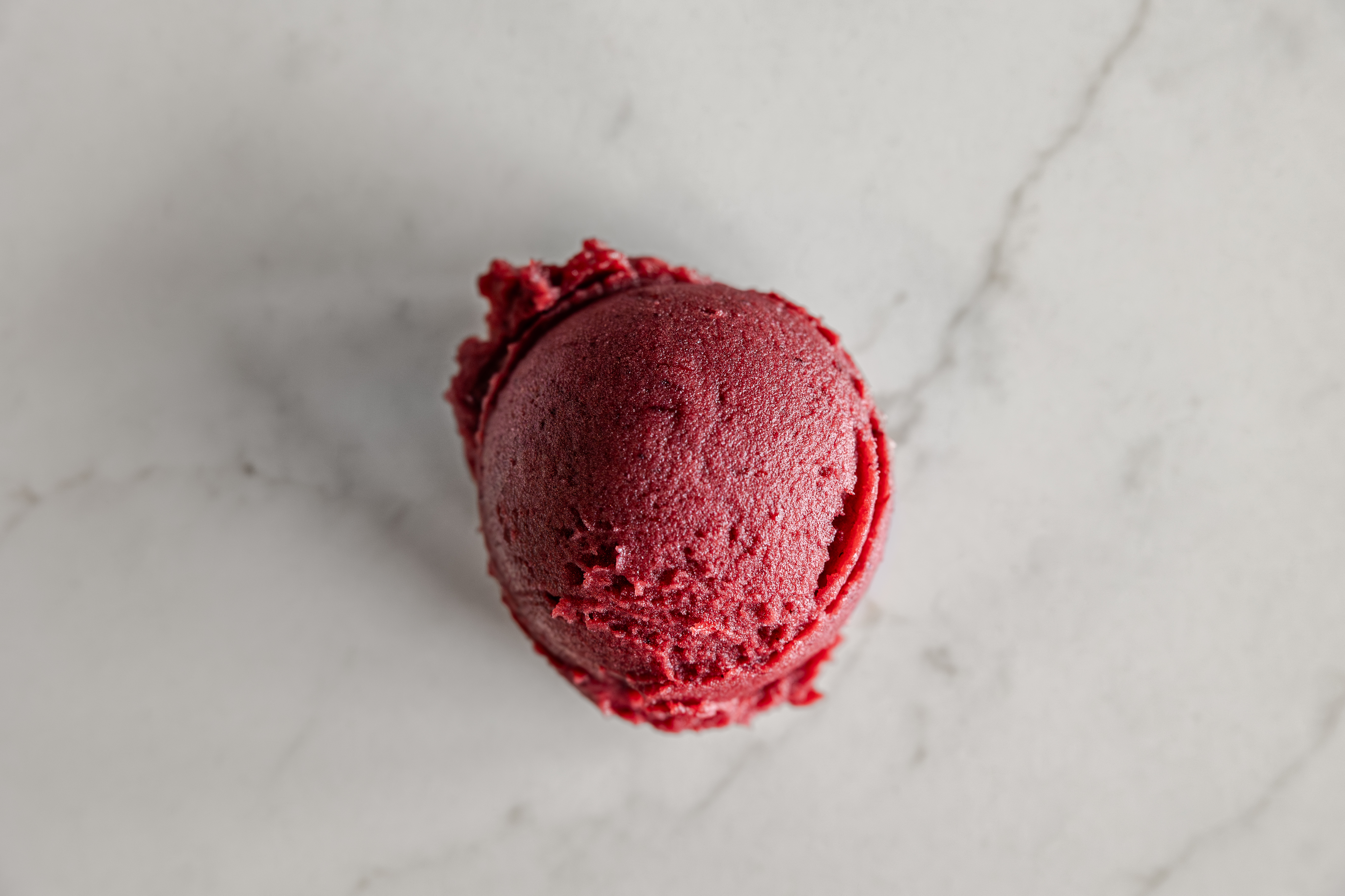 a scoop of blackberry lemon italian ice
