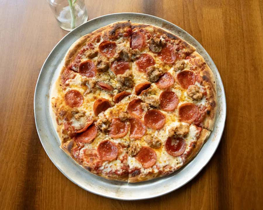 Brick-oven pizza from Bacio catering