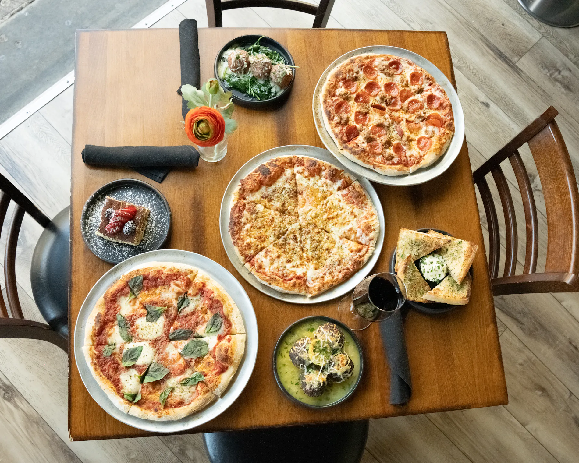 A table full of Italian dishes at Bacio