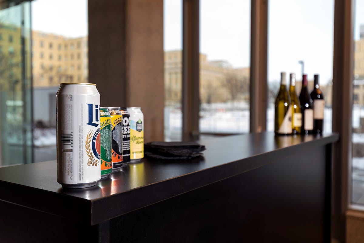 a glass bottle sitting on a counter