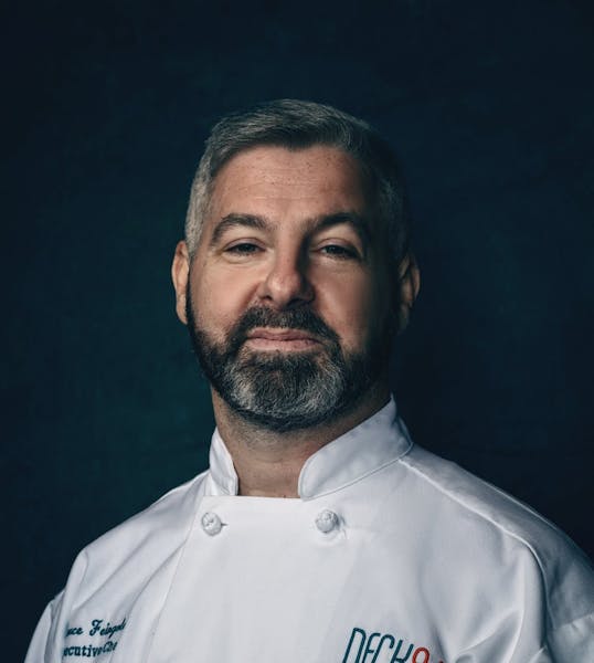 a man wearing a white shirt