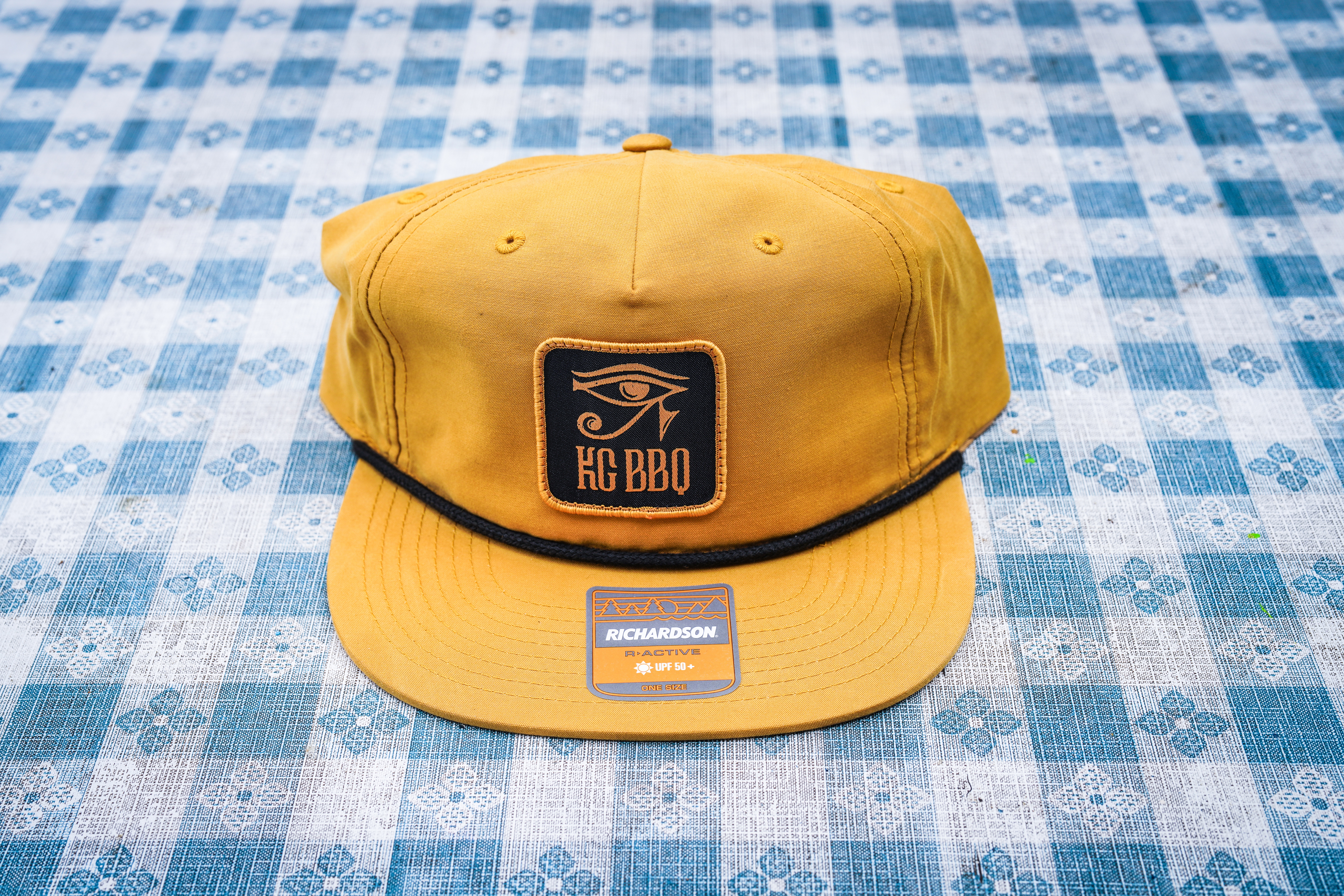 a table topped with a blue hat