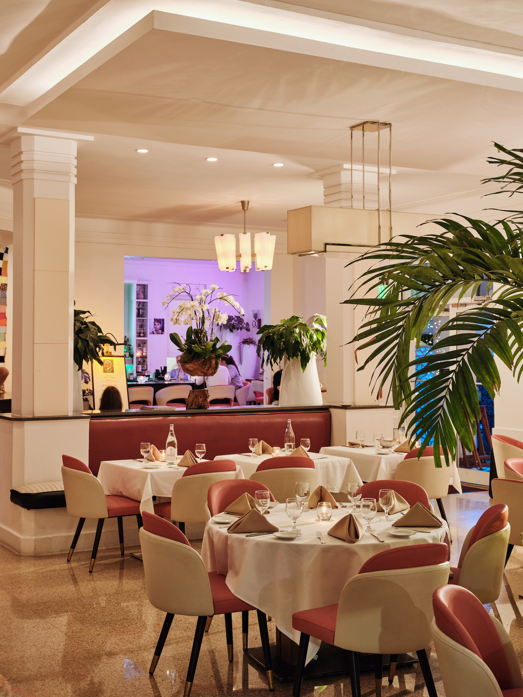 a restaurant with tables and chairs