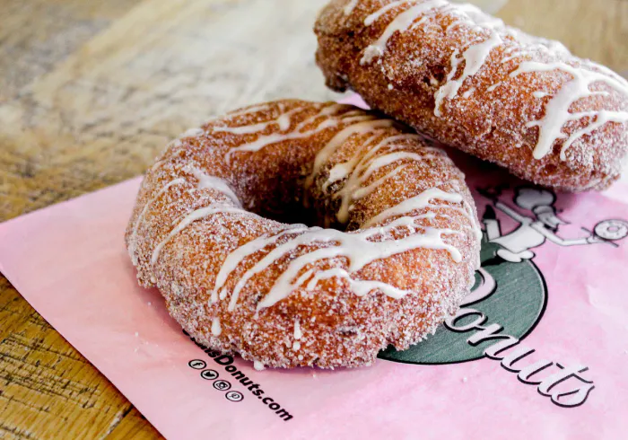 Apple Cider Donuts a donut sitting on top of a table